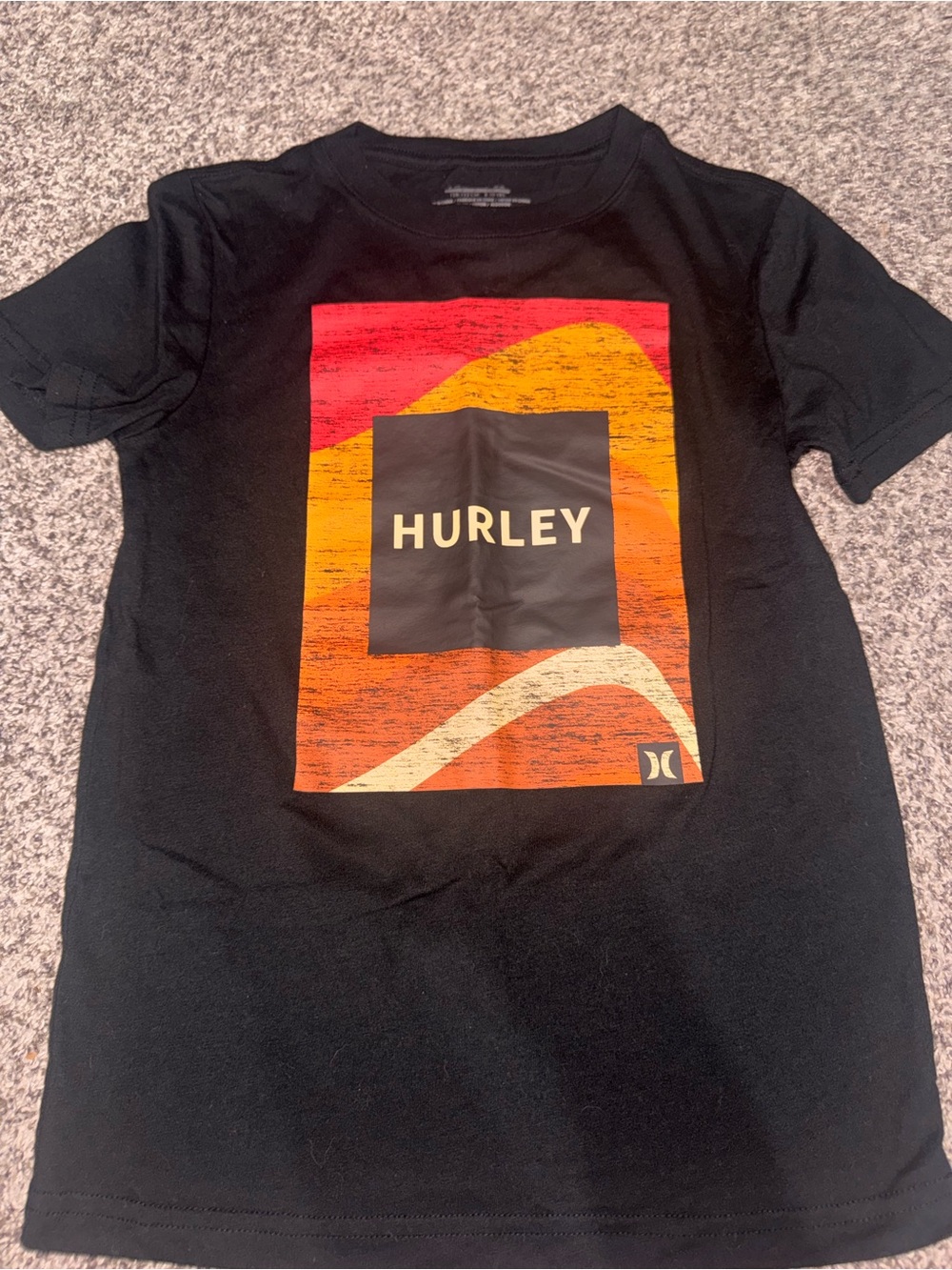 Hurley Black Tee with Red-Orange Sunset Graphic